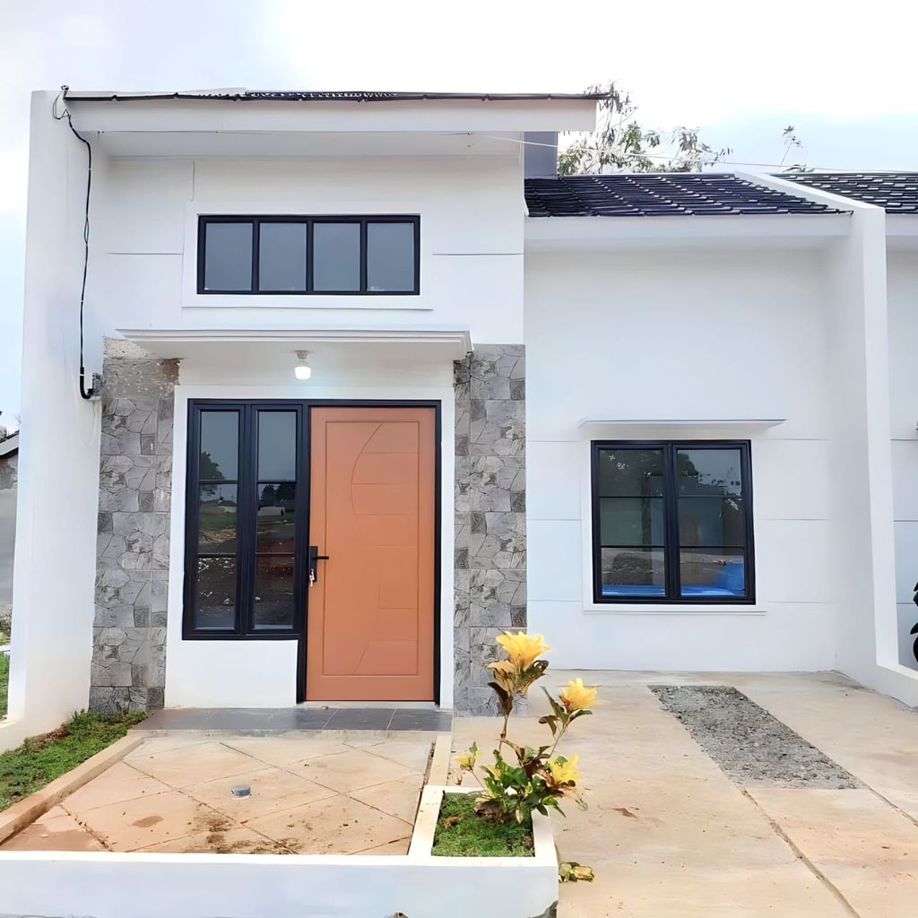 foto tampak rumah tipe 88-85 perumahan KRISMAYA GARDEN