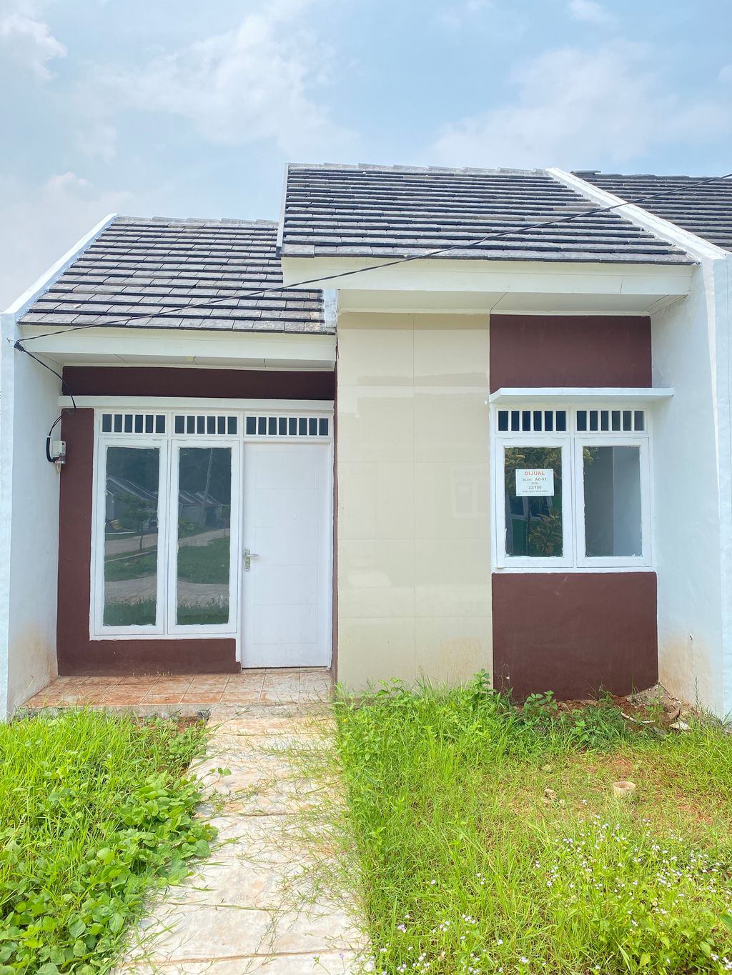 foto tampak rumah tipe 22/97 CASH perumahan Grand Tamansari 3 Residence