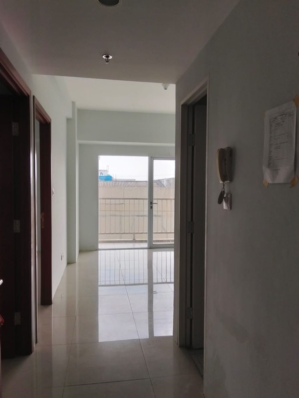 foto tampak rumah tipe 2 Bedroom A perumahan TAMANSARI MAHOGANY APARTMENT