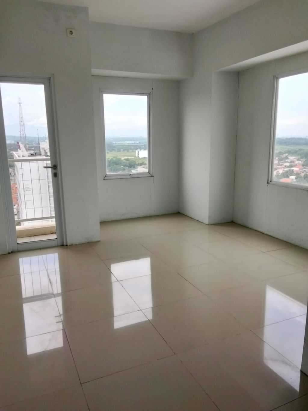 foto tampak rumah tipe Studio B perumahan TAMANSARI MAHOGANY APARTMENT