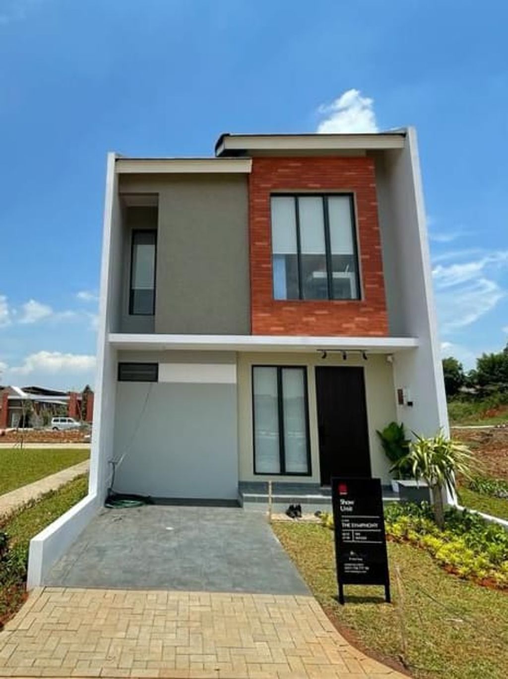 foto tampak rumah tipe ADAGIO perumahan THE SYMPHONY