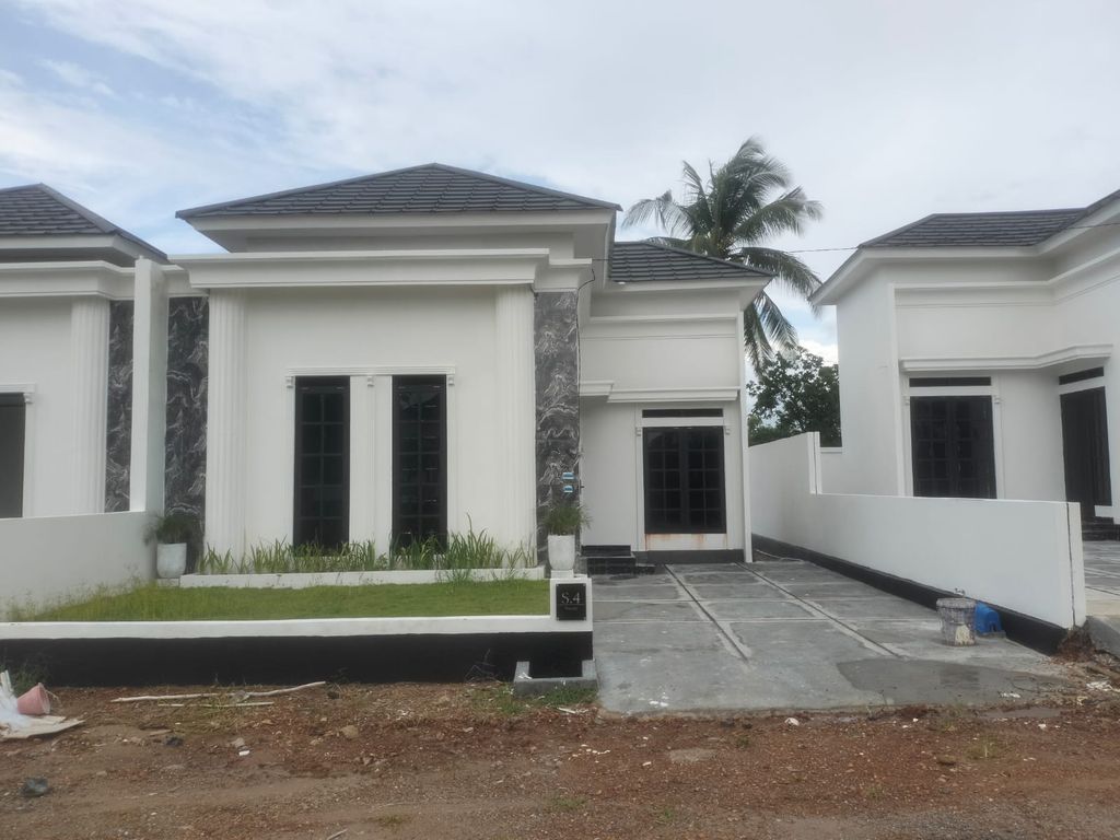foto tampak rumah tipe SWAN 45 perumahan GRAND ASTORIA