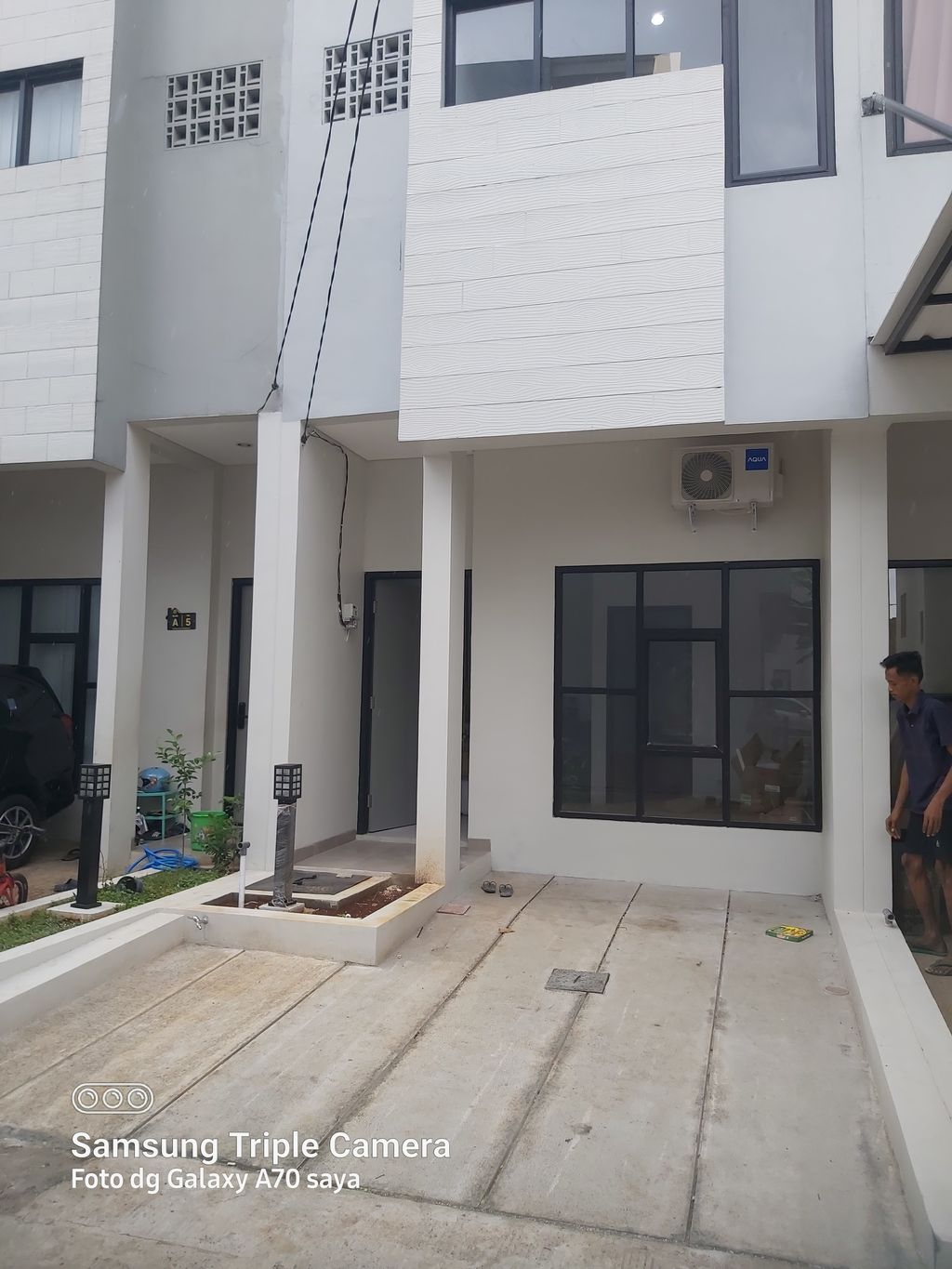 foto tampak rumah tipe Cluster perumahan Pinangranti Mansion 2