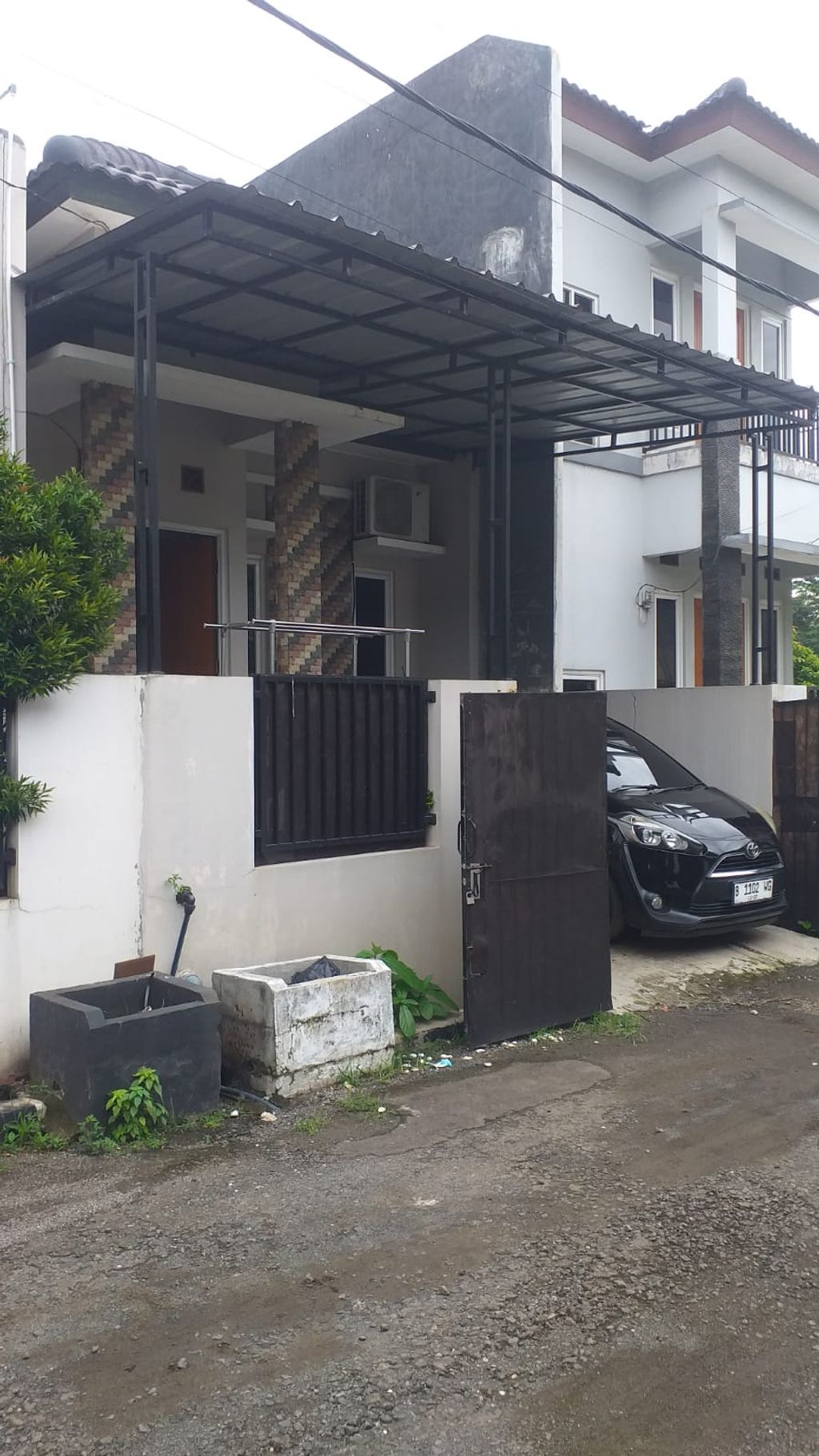 foto tampak rumah tipe 36/35 perumahan BUMI CIMANGGIS INDAH 2