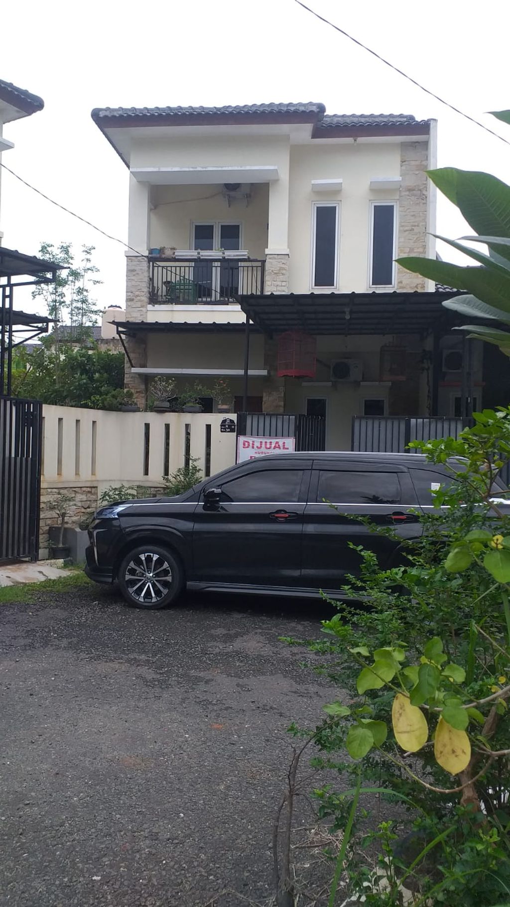foto tampak rumah tipe 82/107 perumahan BUMI CIMANGGIS INDAH 2