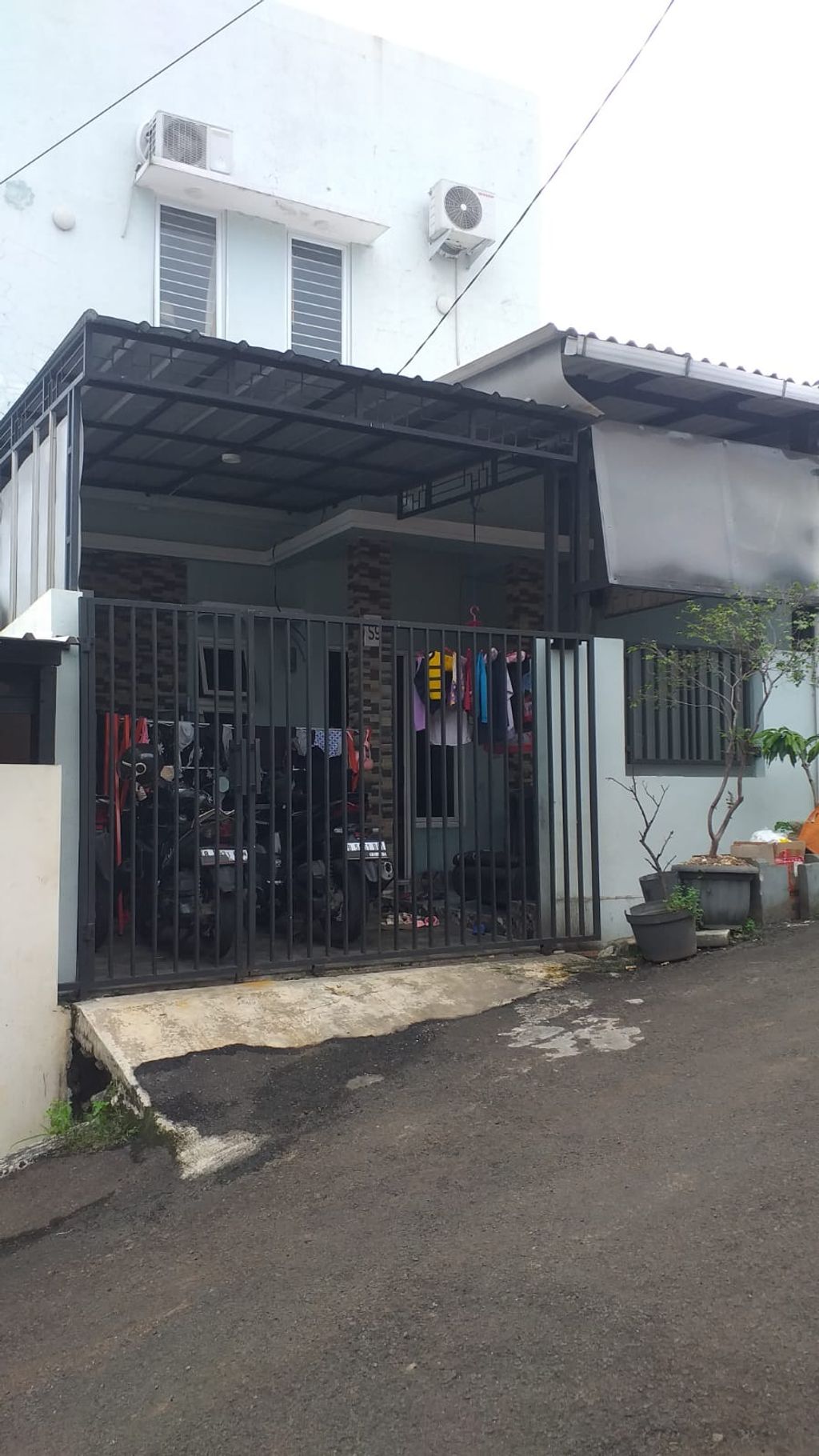 foto tampak rumah tipe 34/51 perumahan BUMI CIMANGGIS INDAH 2
