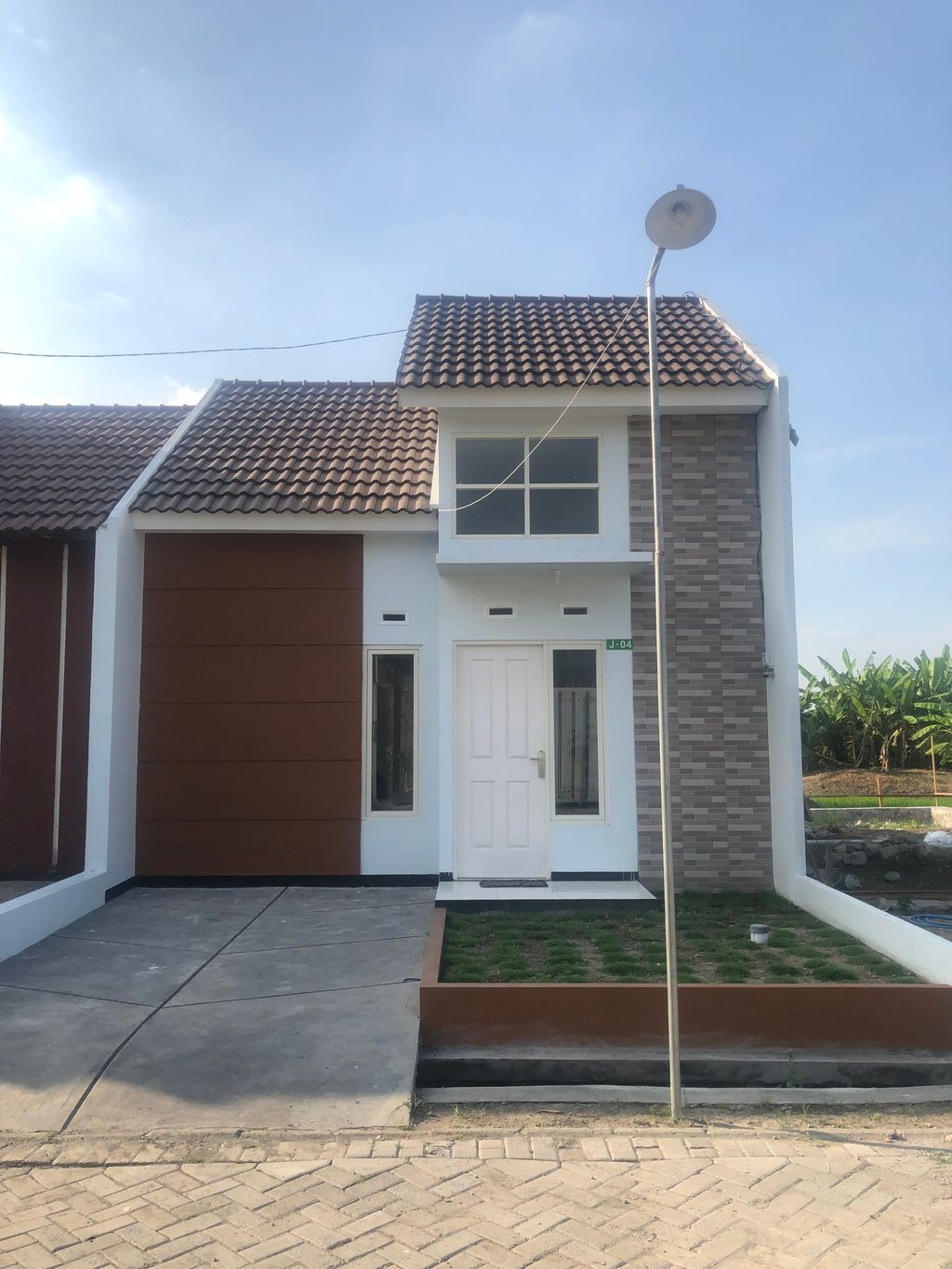 foto tampak rumah tipe T36/85 perumahan GRIYA PERMATA MERI BY PASS