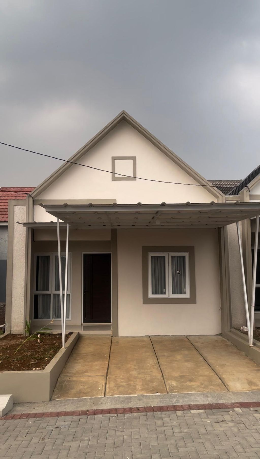 foto tampak rumah tipe 36/72 perumahan KOPKAR GOBEL RESIDENCE