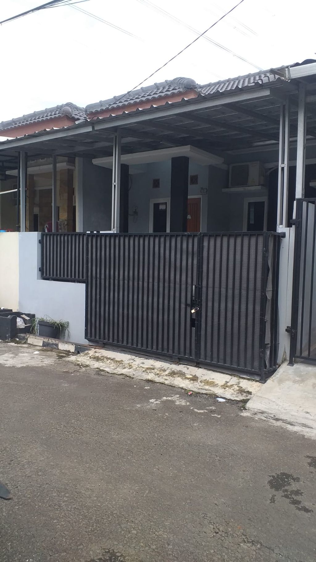foto tampak rumah tipe 36/65 perumahan BUMI CIMANGGIS INDAH 2