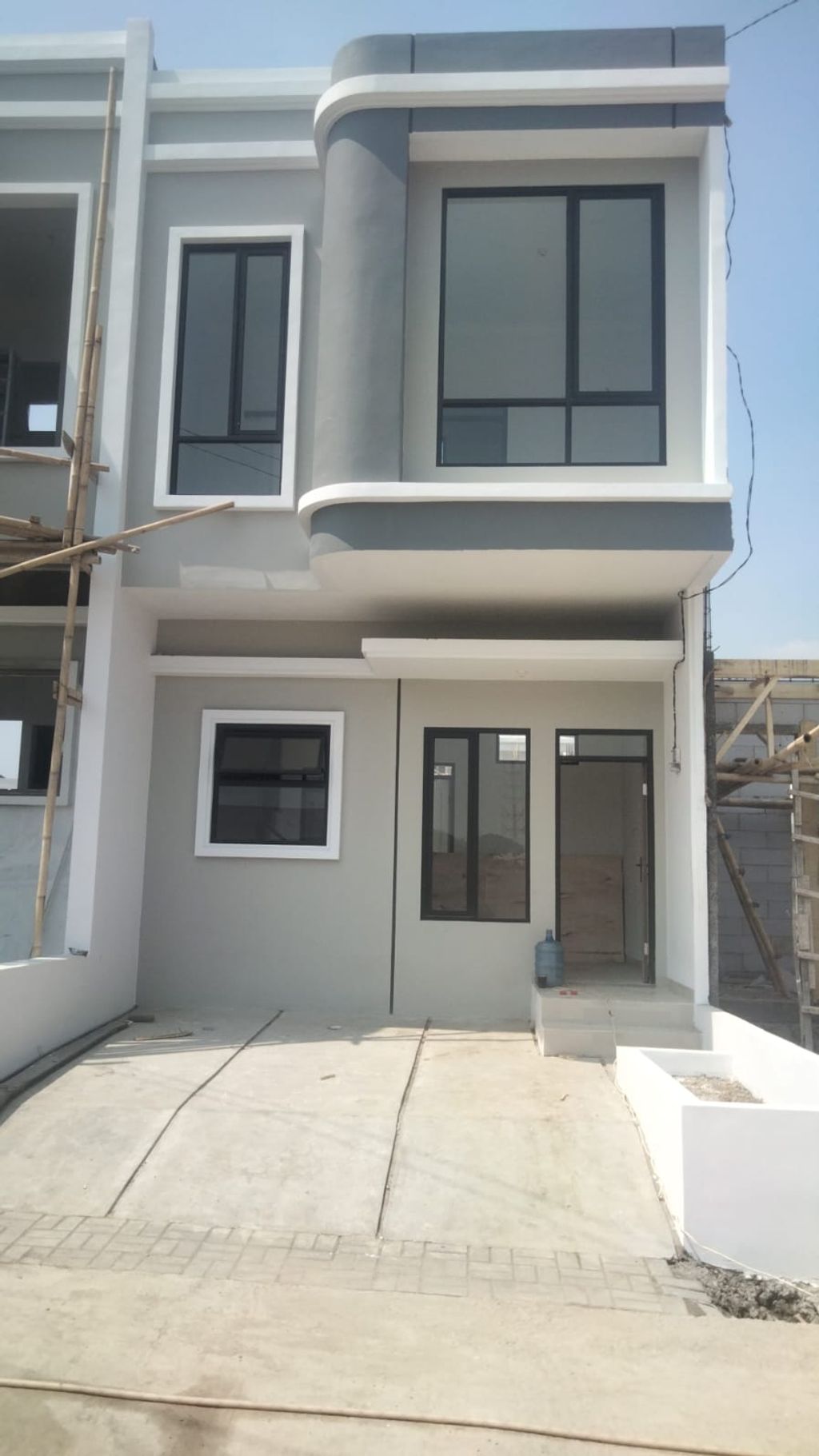 foto tampak rumah tipe 38 Compact - Superimposed(367) perumahan G-Land Aleena Residence