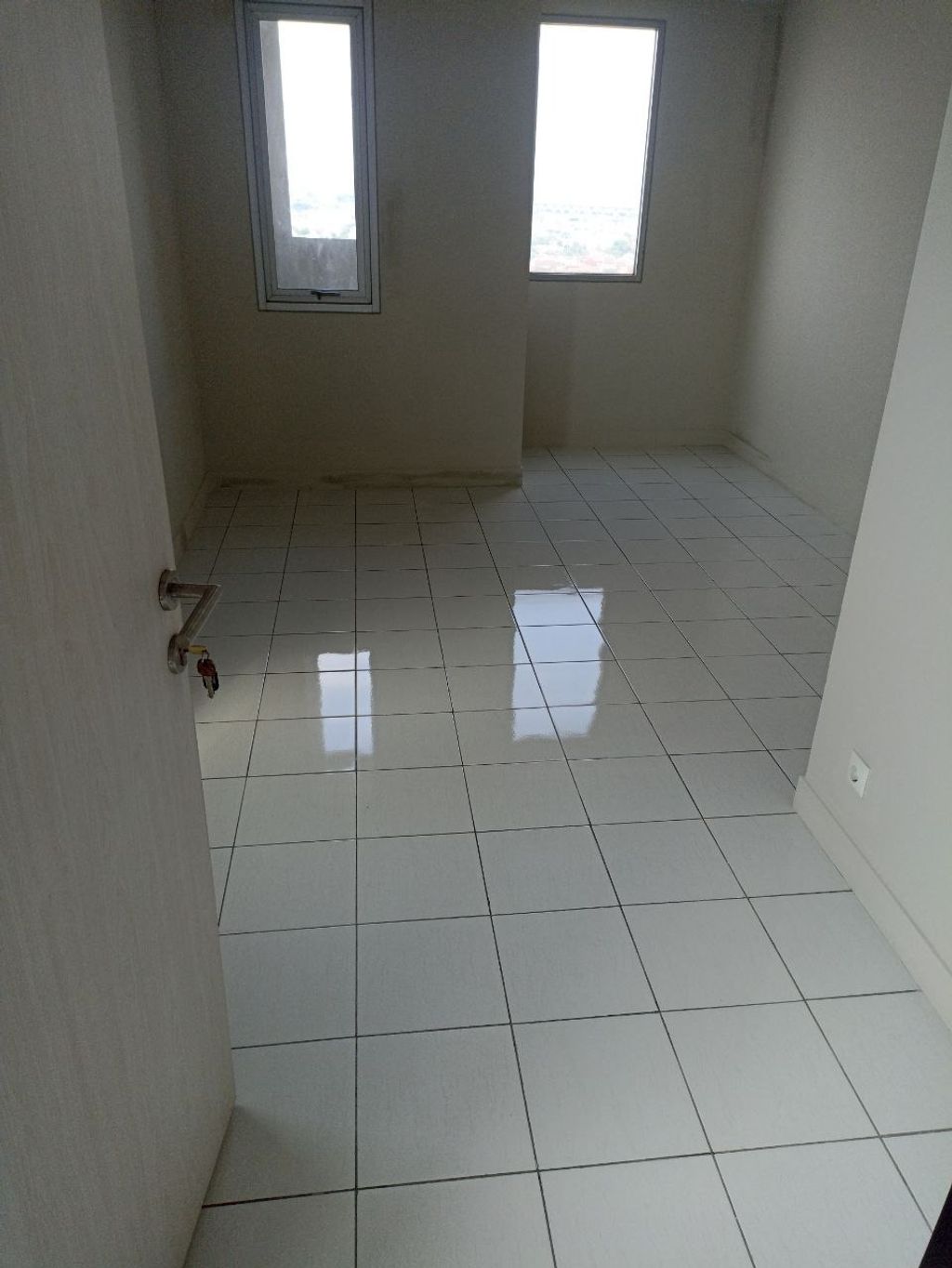 foto tampak rumah tipe STUDIO CORNER A perumahan Grand Kamala Lagoon