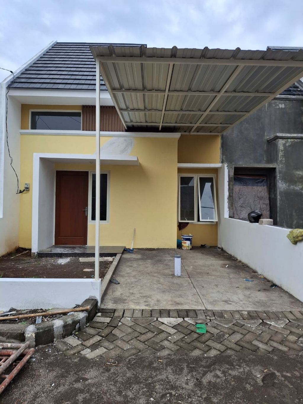 foto tampak rumah tipe 38/156 perumahan PALM VILLE REGENCY