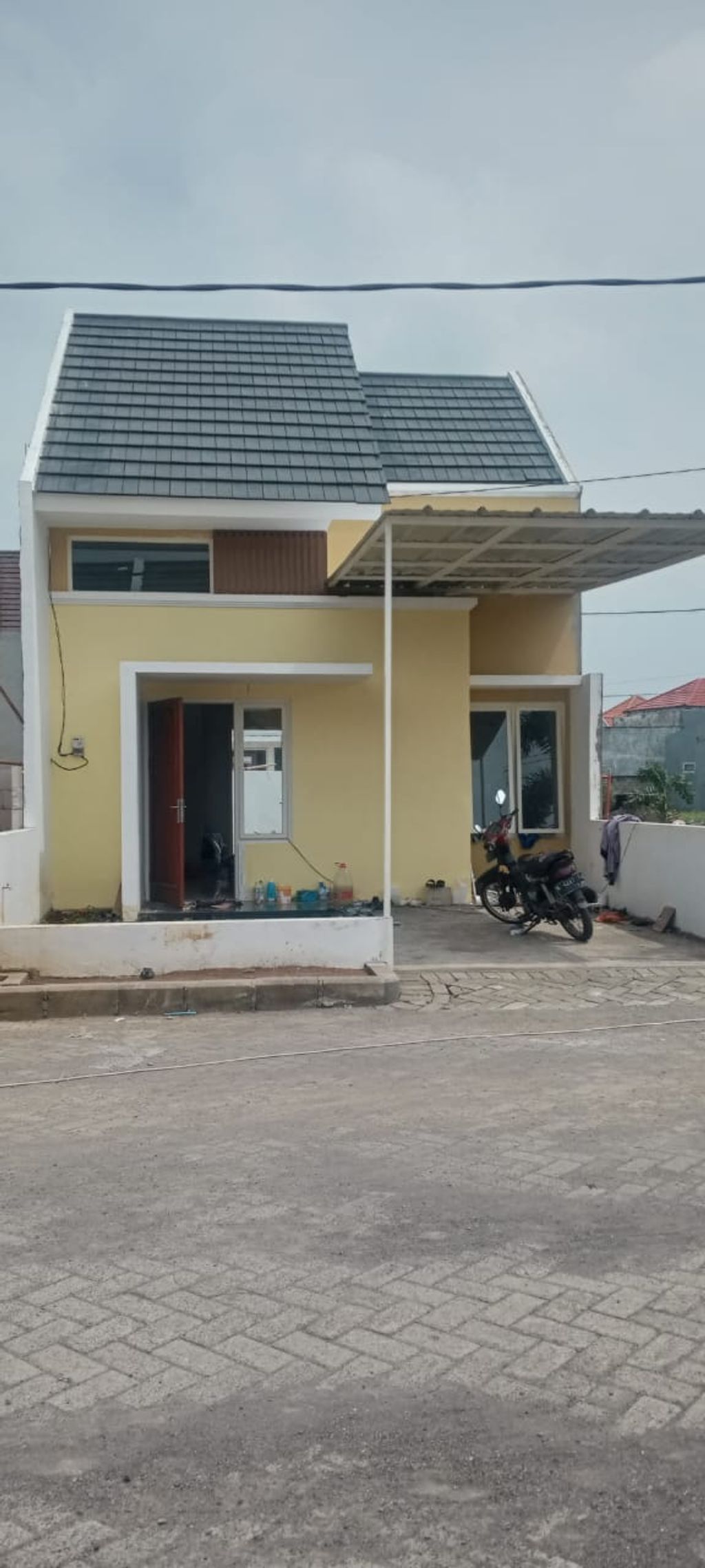 foto tampak rumah tipe 38/100 perumahan PALM VILLE REGENCY