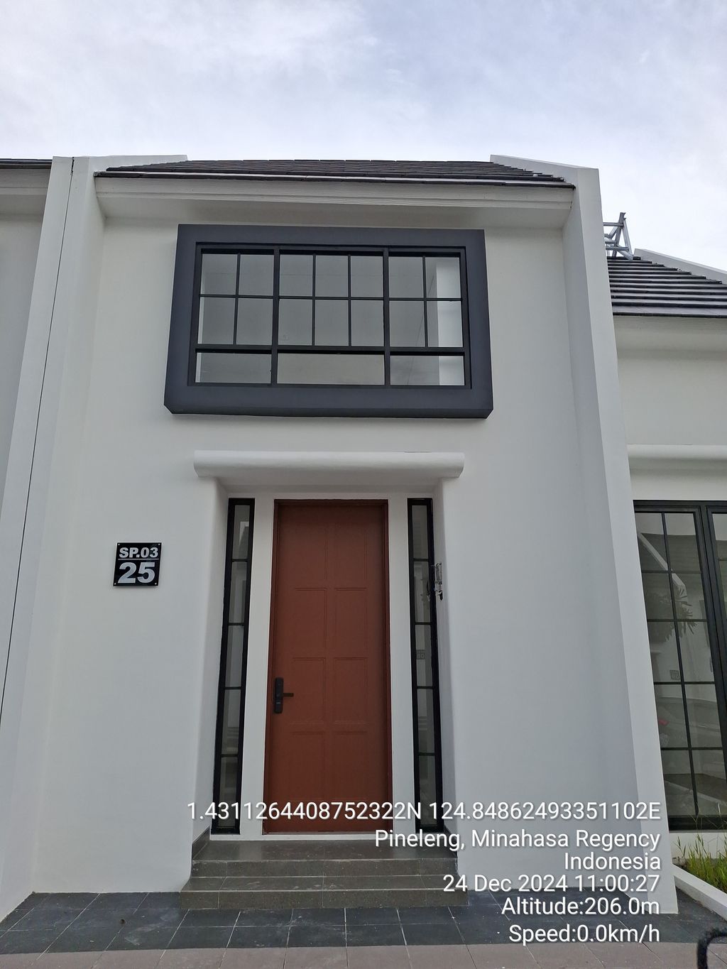 foto tampak rumah tipe MELROSE perumahan CITRALAND WINANGUN MANADO CLUSTER SKY PARK