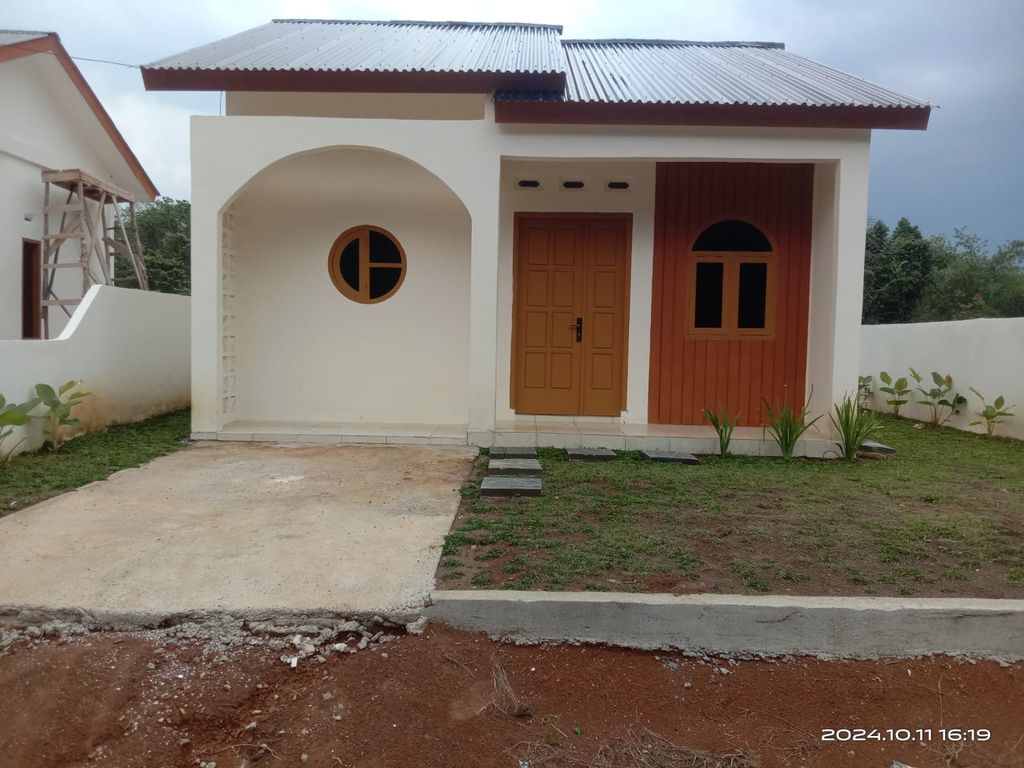 foto tampak rumah tipe 36/140 perumahan Ezar Residence