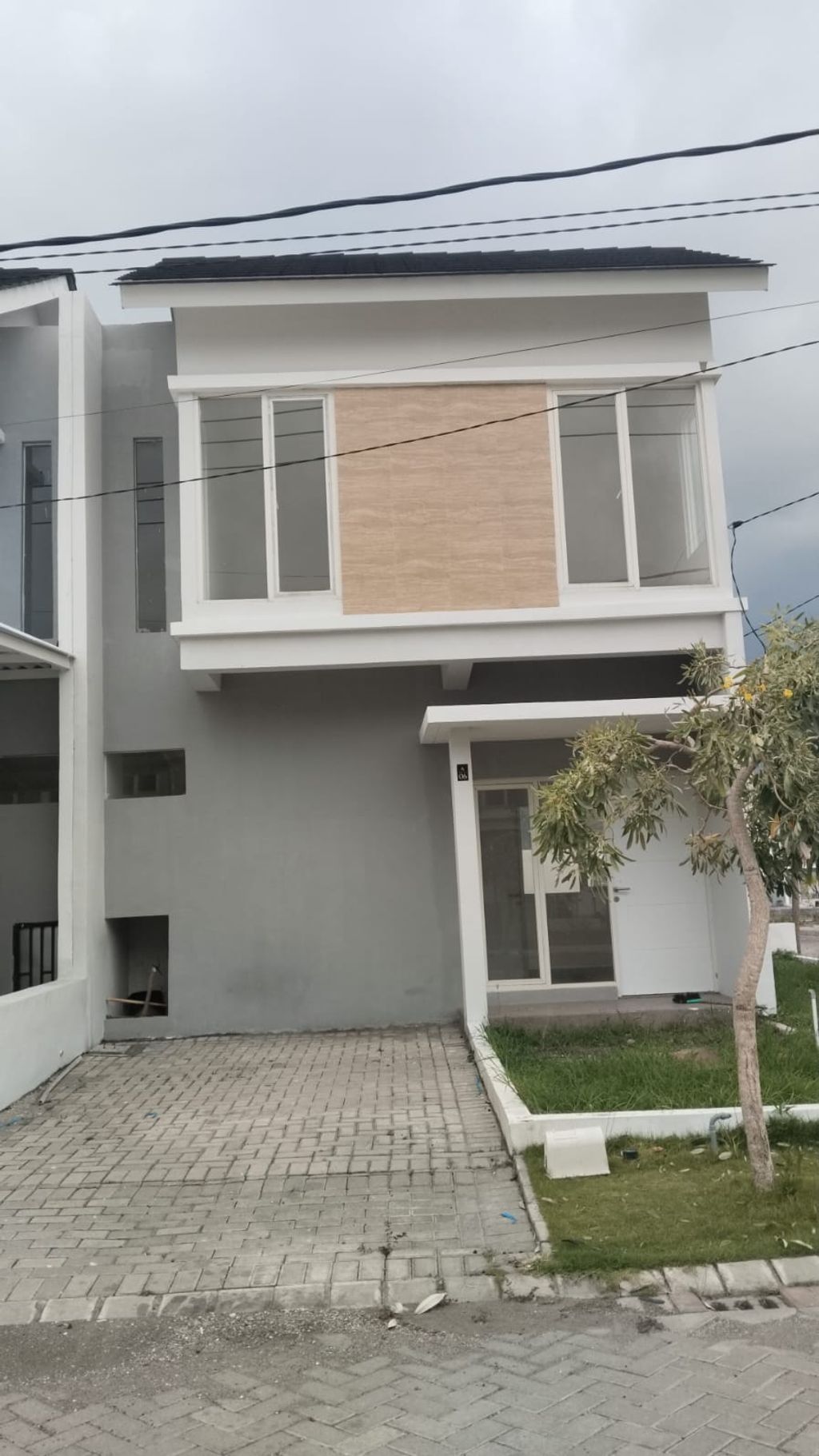 foto tampak rumah tipe Blok A-06 Avila perumahan The Anvaya Juanda