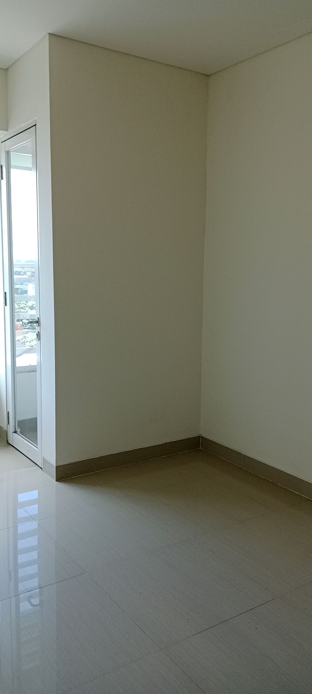 foto tampak rumah tipe BARCLAY NORTH 1 BR G perumahan GRAND KAMALA LAGOON TOWER EMERALD & BARCLAY