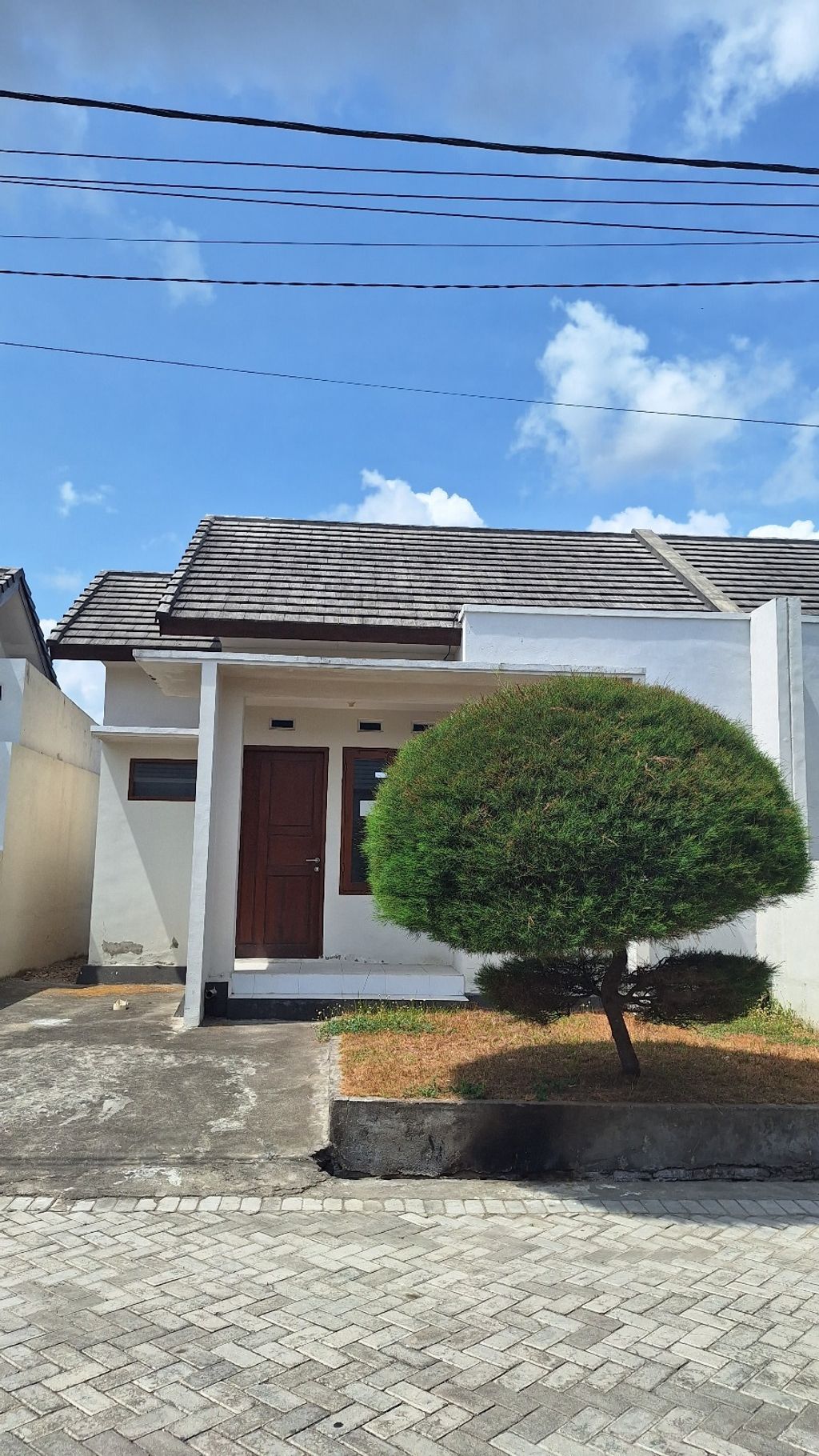 foto tampak rumah tipe 36/100 perumahan BUMI HARAPAN PERMAI TAHAP 3
