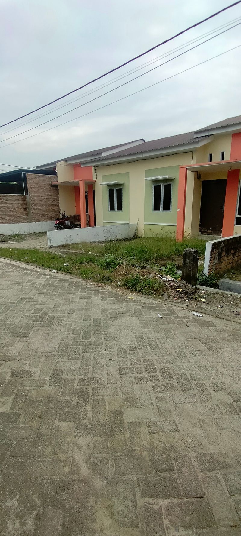 foto gerbang perumahan PERUMAHAN PESONA KARYA 2