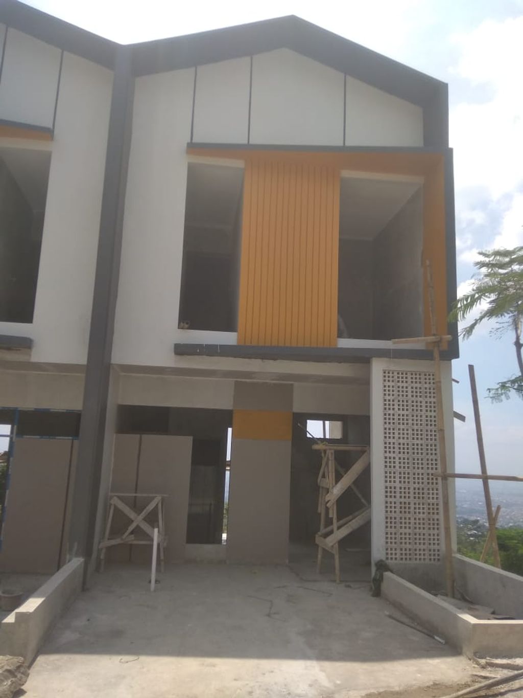 foto tampak rumah tipe 38 Cozy Level Minimalis (2 KT) (475) perumahan G-Land Harmony Hills