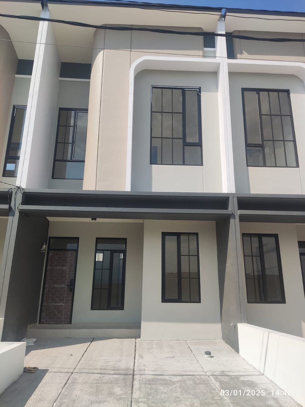 foto tampak rumah tipe 43 Compact High Ceiling (3KT) (526) perumahan G-Land Ciwastra Park 2