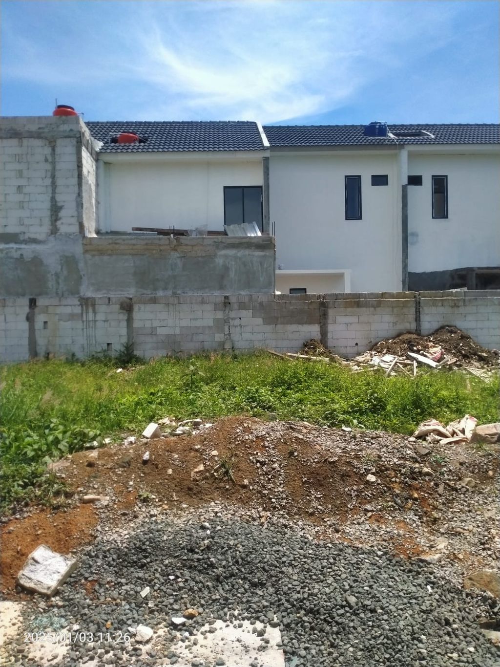 foto tampak rumah tipe 47 Compact High Ceiling (3KT)(463) perumahan Griya Pataruman Asri 3