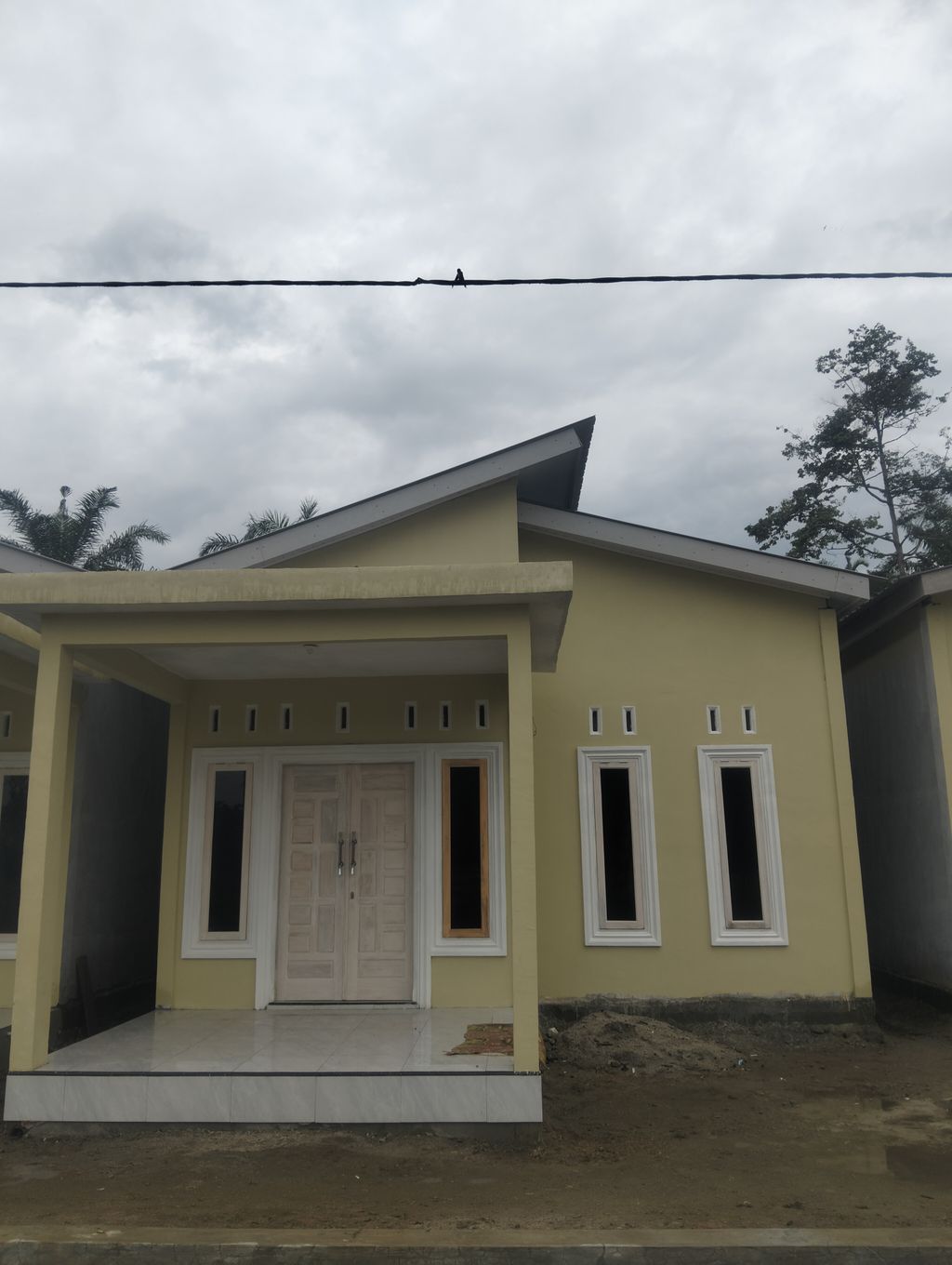 foto contoh rumah perumahan PUTRI HIJAU