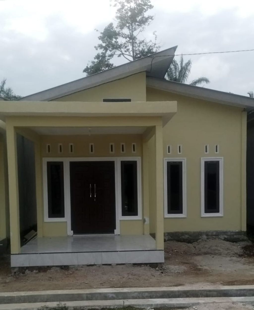 foto tampak rumah tipe 36 perumahan PUTRI HIJAU