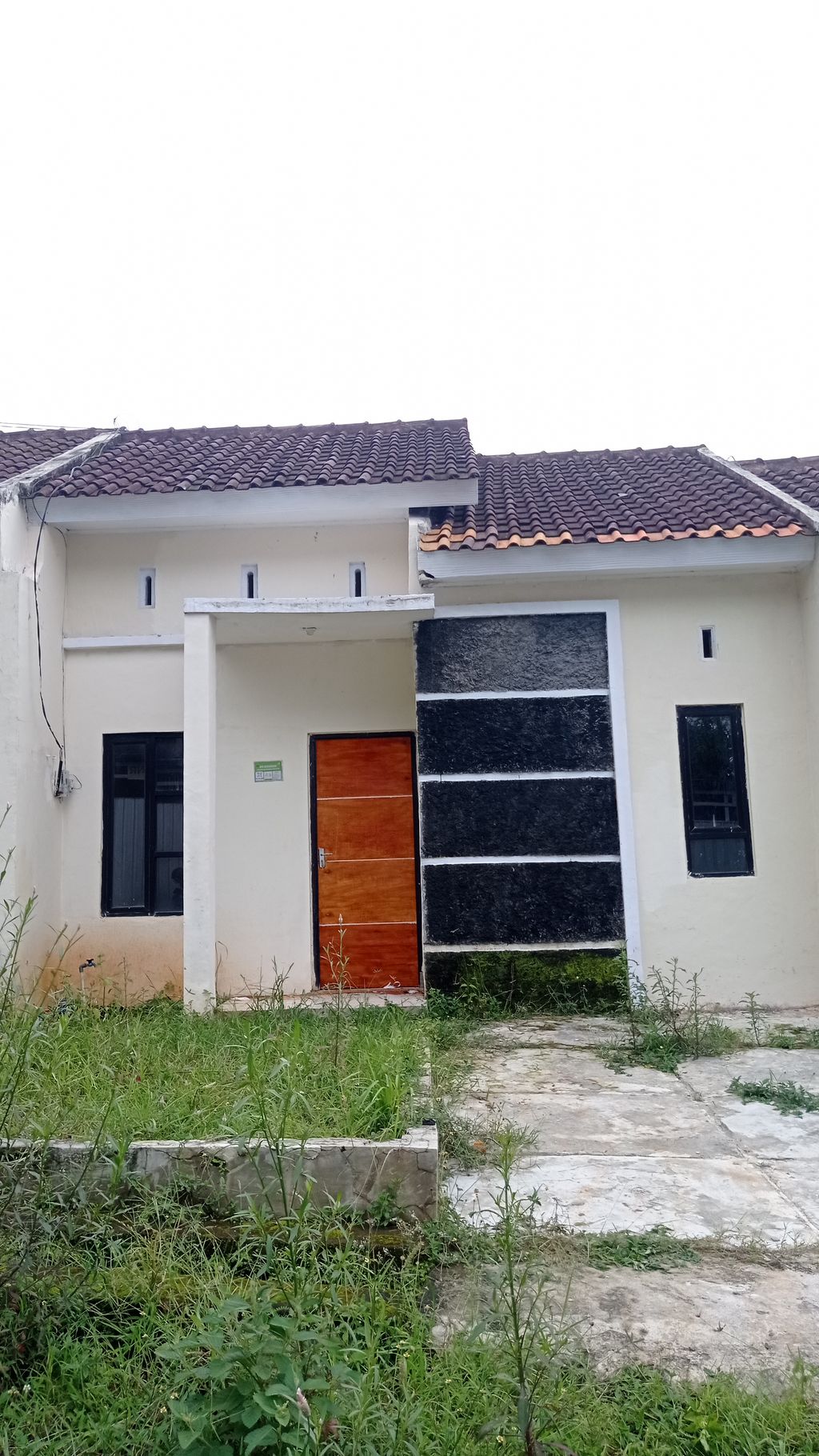 foto tampak rumah tipe 31/66 perumahan GRAHA KENCANA TRAGUNG