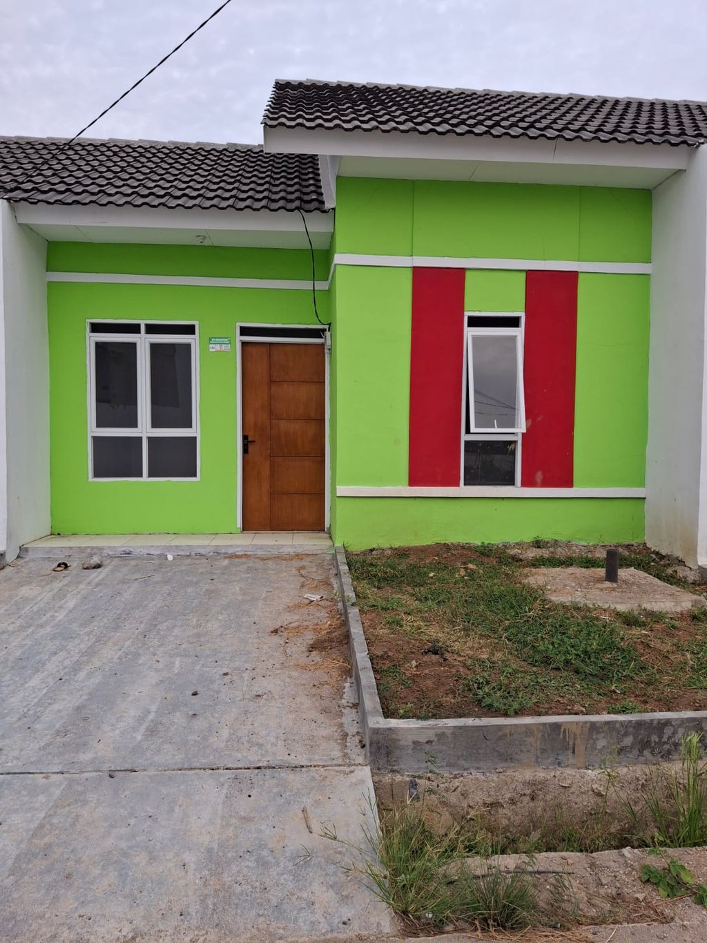 foto tampak rumah tipe 30/60 perumahan BUMI SUKASARI INDAH