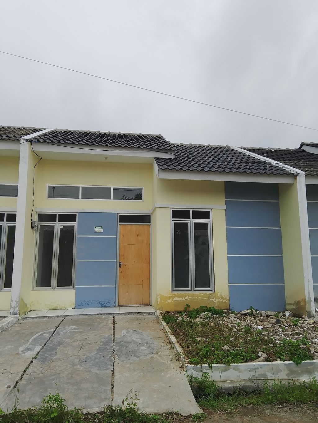 foto tampak rumah tipe II perumahan SWADHARMA PABUARAN RESIDENCE