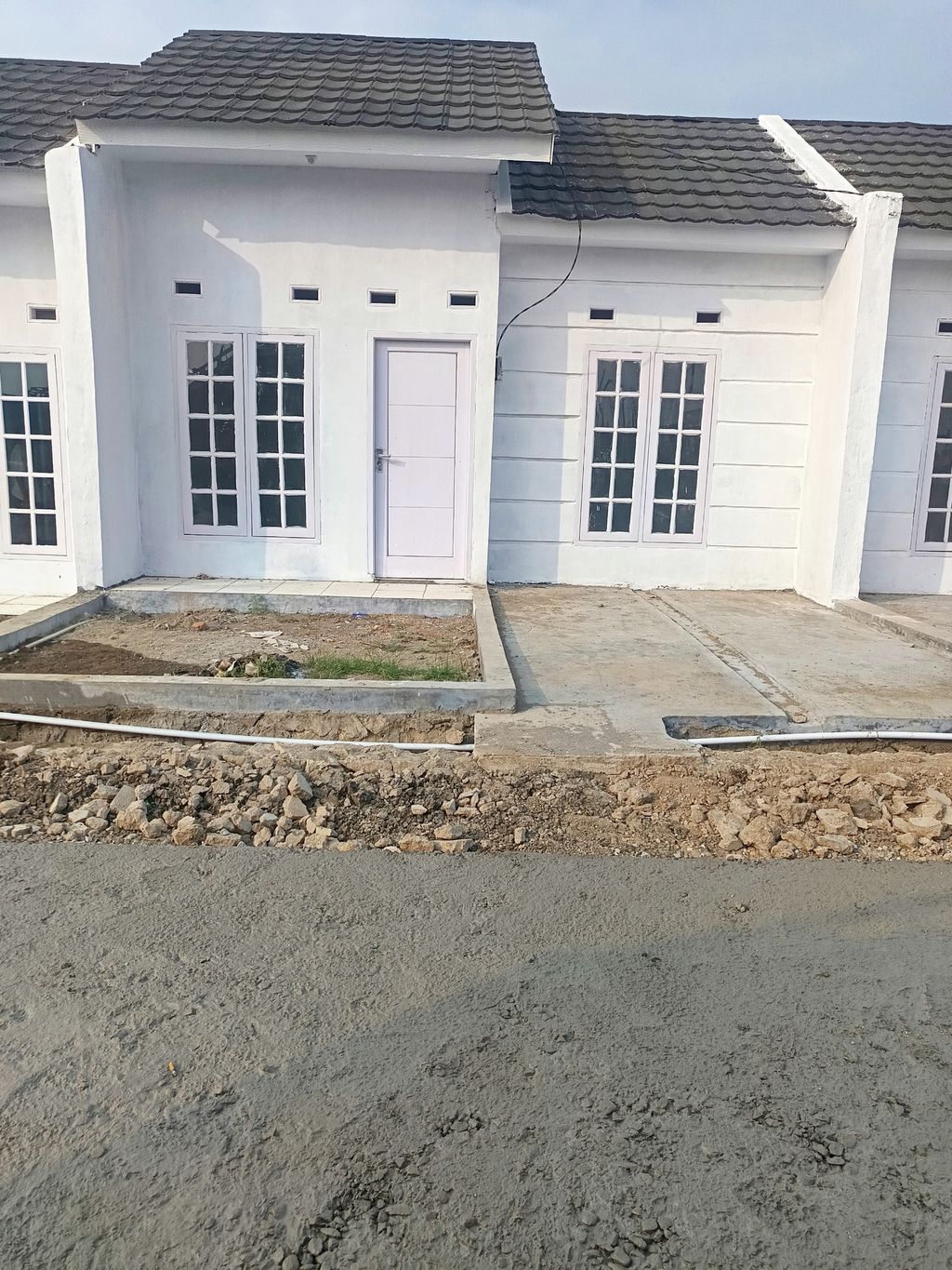 foto tampak rumah tipe 30/60 perumahan GRAHA ALAM JAYA