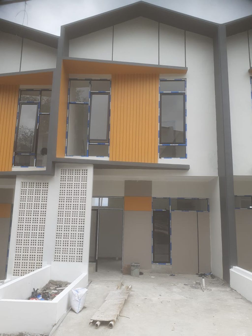 foto tampak rumah tipe 38 Cozy Level Minimalis (2 KT) (462) perumahan G-Land Harmony Hills