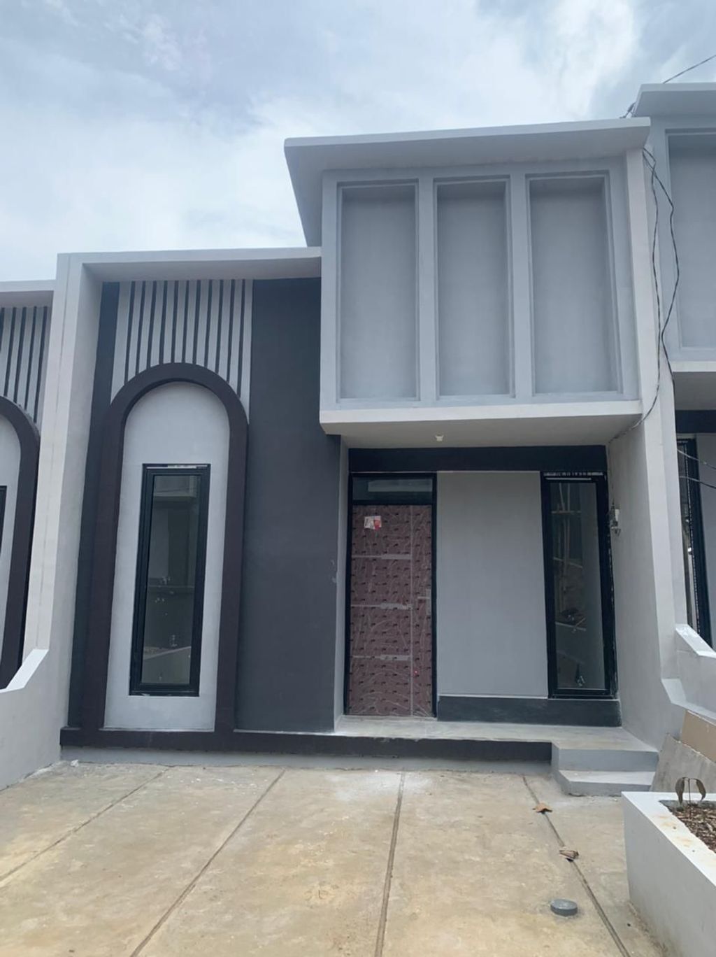 foto tampak rumah tipe 30 1 Lantai Kontur 1m (349) perumahan G-Land Padalarang Valley