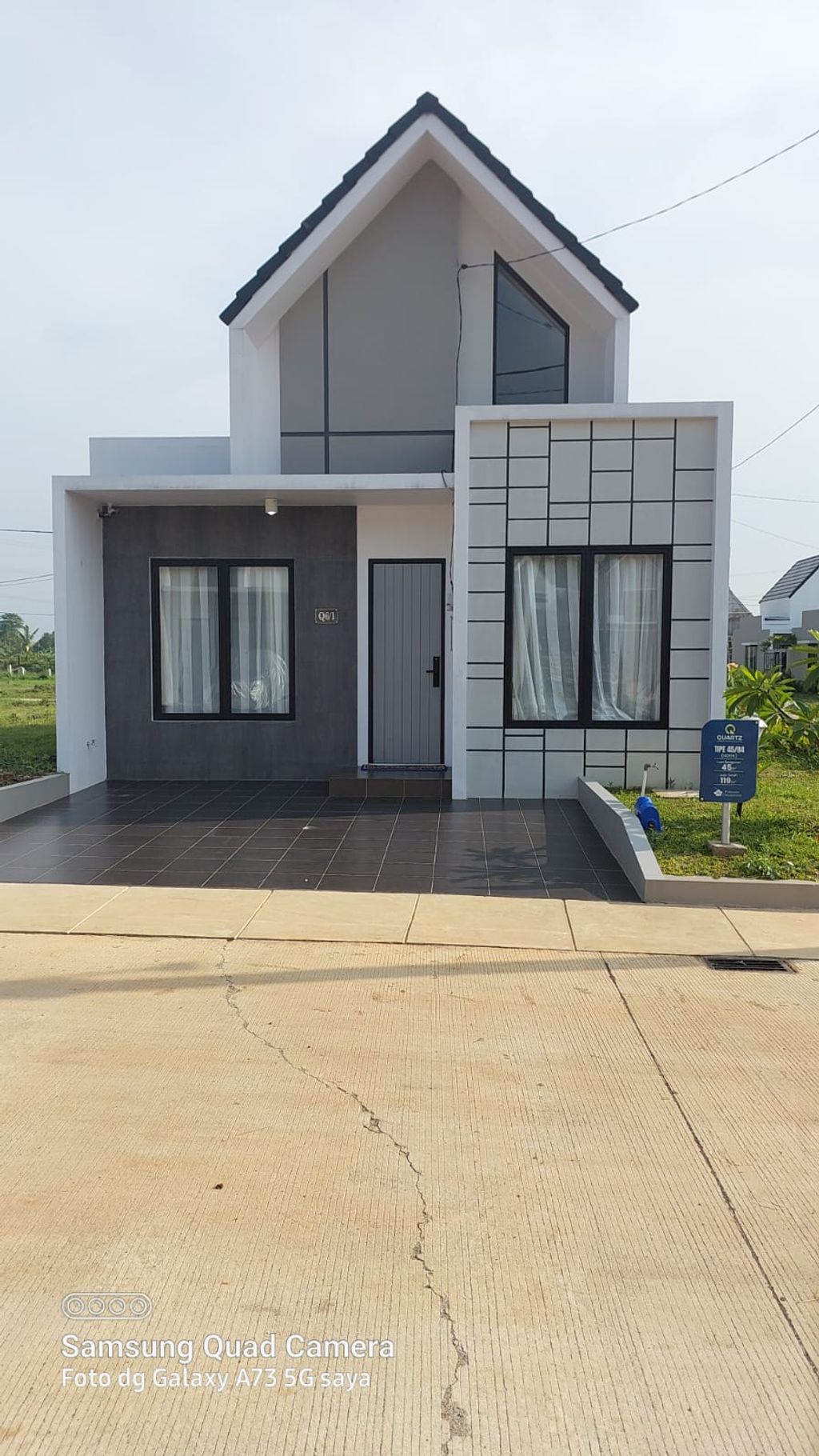 foto tampak rumah tipe QUARTZ - 45/120 perumahan PERUMAHAN PERMATA CIMANGGIS THP 3