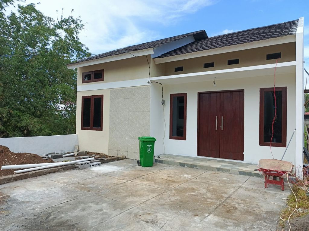 foto tampak rumah tipe KOMERSIL perumahan THE GREEN WOLOAN RESIDENCE
