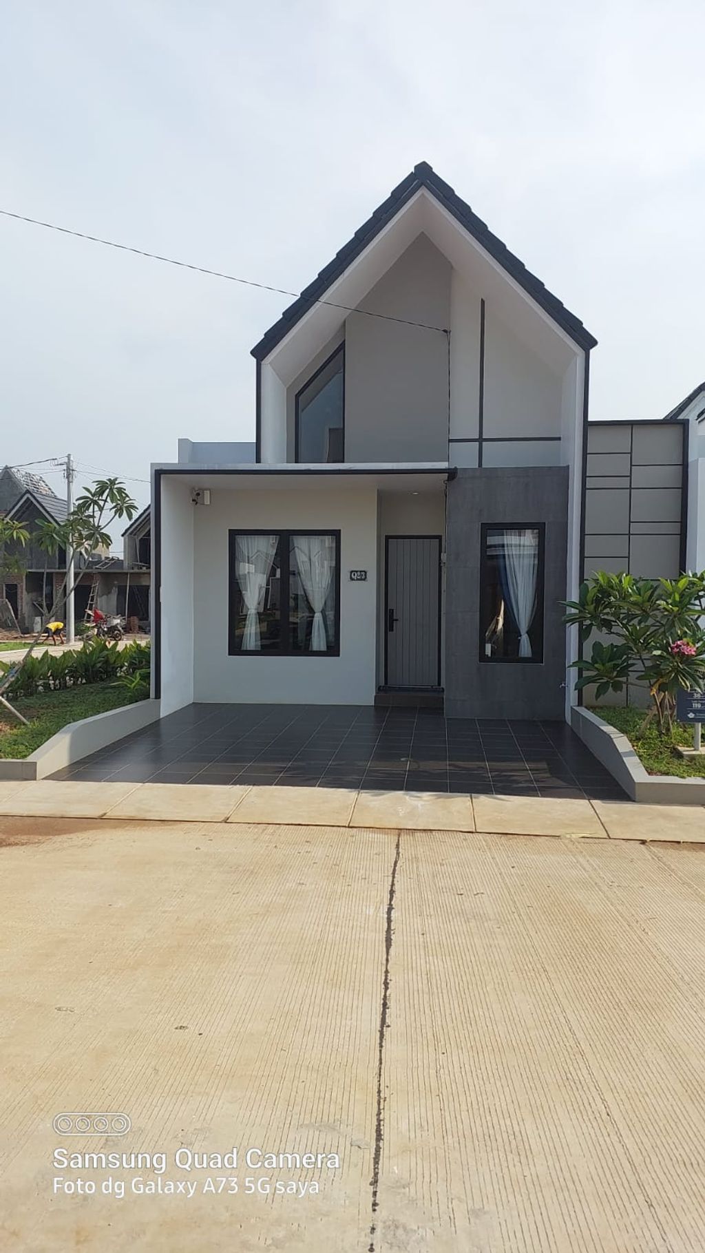 foto tampak rumah tipe QUARTZ - 36/119 perumahan PERUMAHAN PERMATA CIMANGGIS THP 3