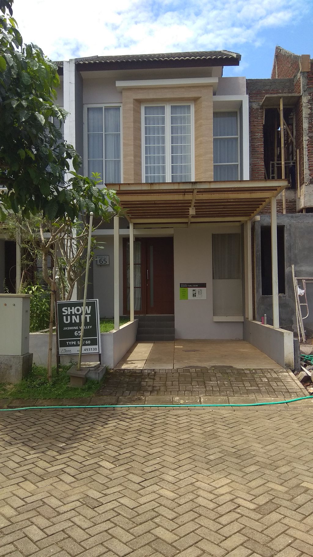 foto tampak rumah tipe JASMINE VALLEY 58/60 perumahan The Araya