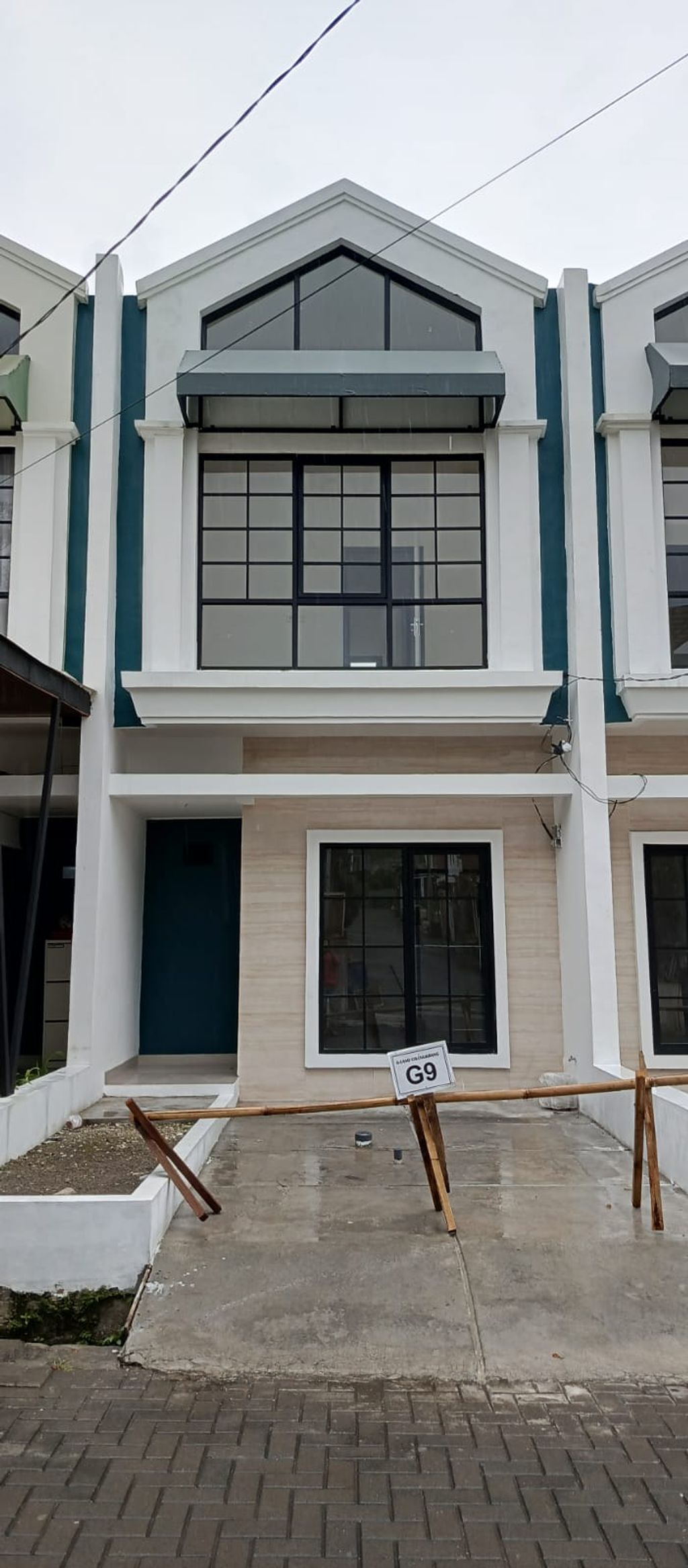 foto tampak rumah tipe 50 Compact Classic Modern HC (3KT) (597) perumahan G-Land Cilengkrang Residence Blok G-I