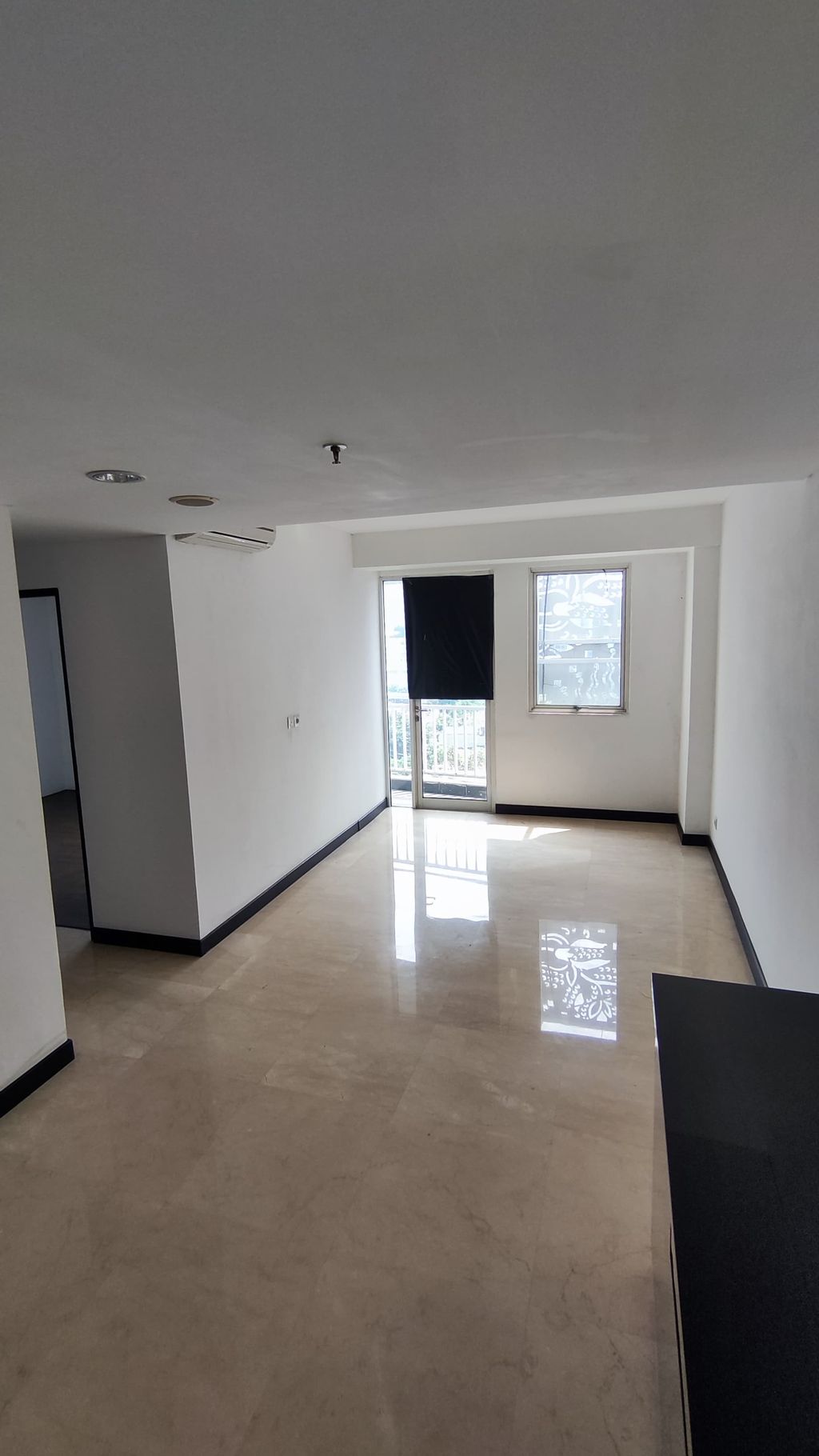 foto tampak rumah tipe 2 bed room perumahan The Bellevue Suites