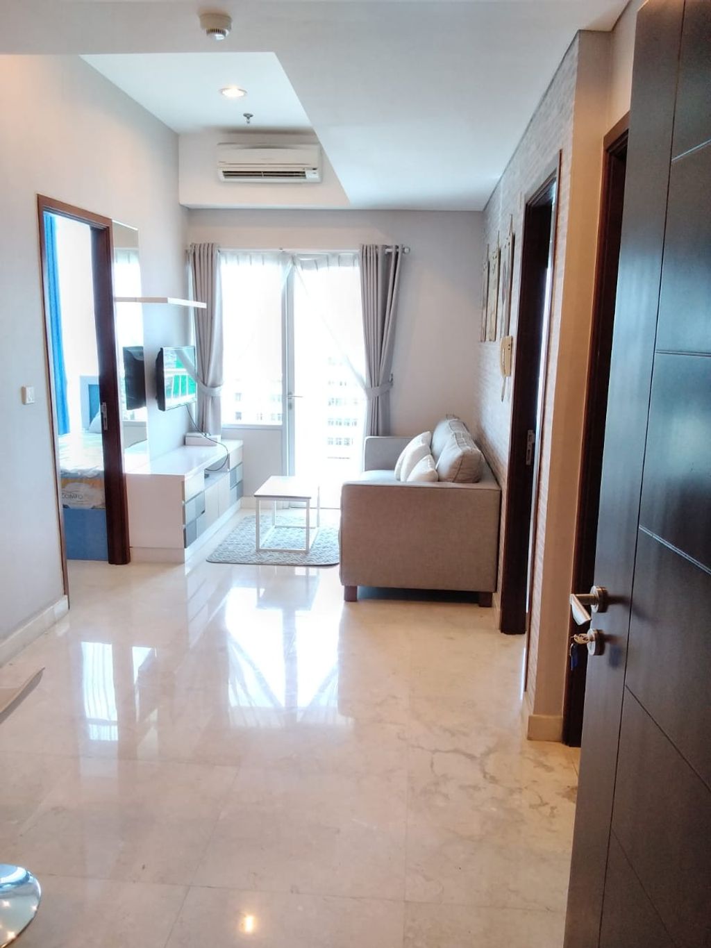 foto tampak rumah tipe PHJ perumahan Capitol Park Residence