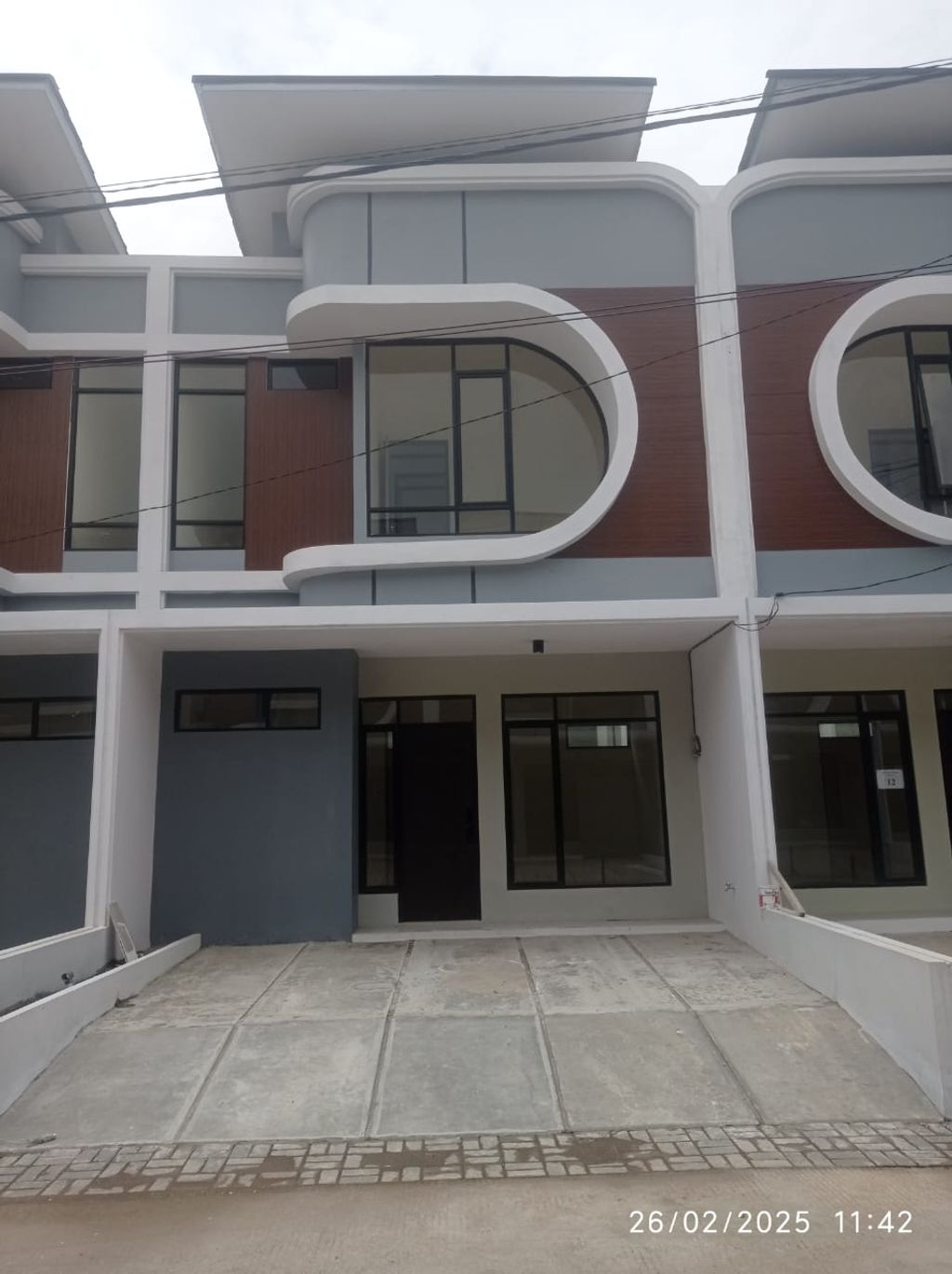 foto tampak rumah tipe 57 Compact High Ceiling (3KT) (644) perumahan G-Land Ciwastra Park 2