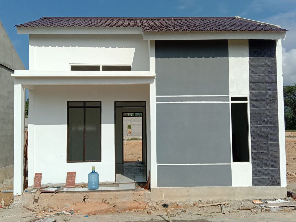 foto tampak rumah tipe 36 perumahan BUMI EMAS LEDO