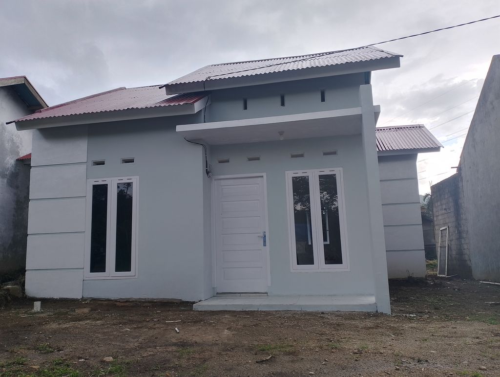 foto contoh rumah perumahan TIMBARAU GARDEN