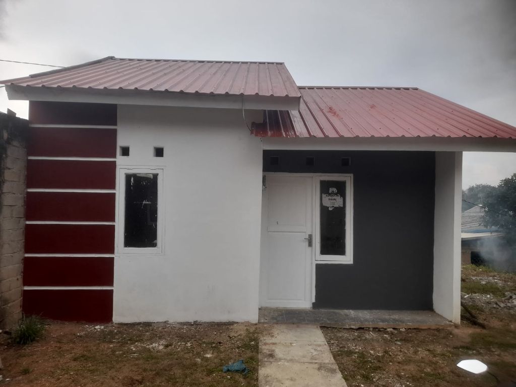 foto tampak rumah tipe RST 36/105 B Gardu perumahan Perumnas Bumi Air Raja