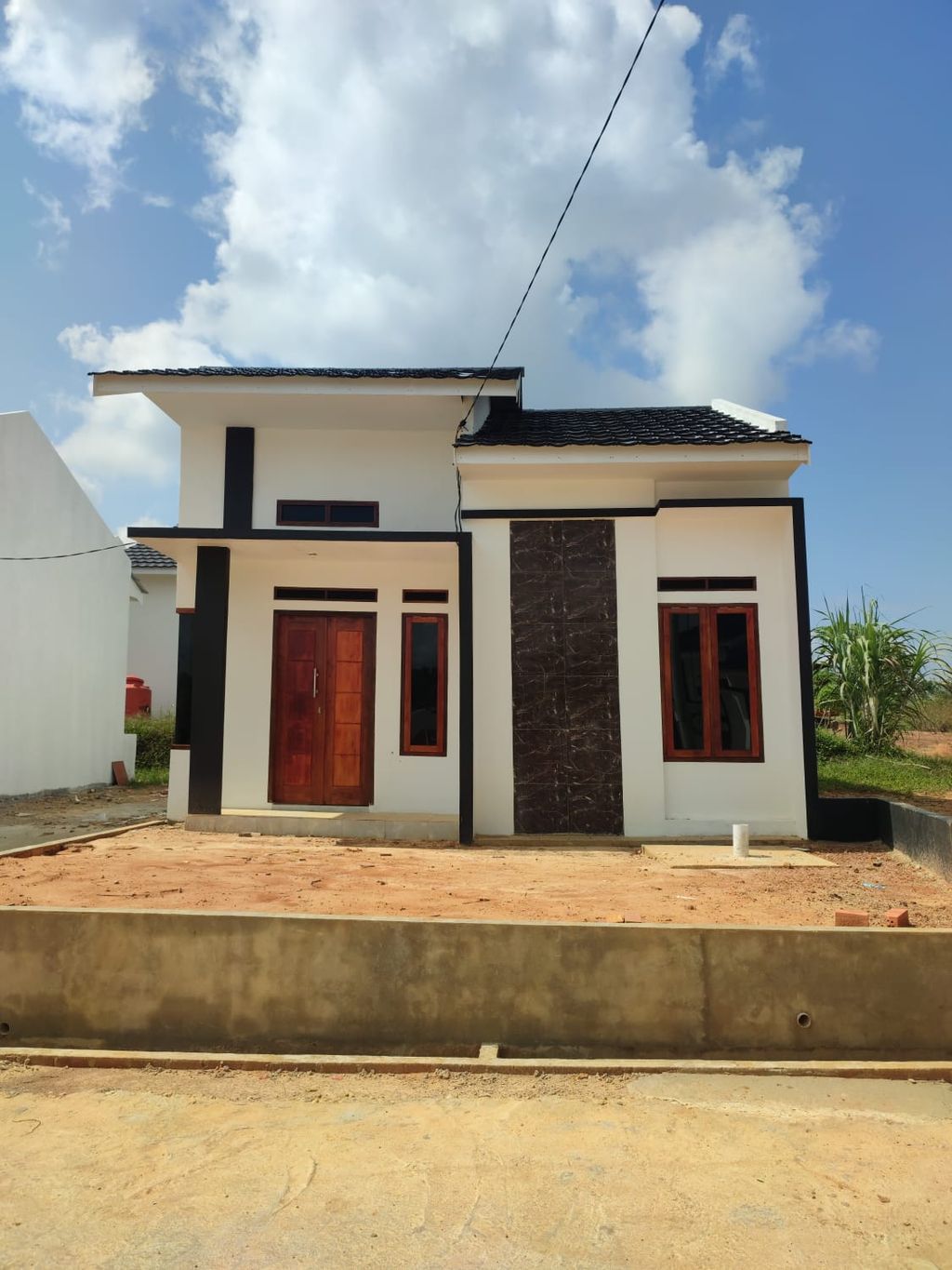 foto tampak rumah tipe 36 perumahan Fazs Ca Land