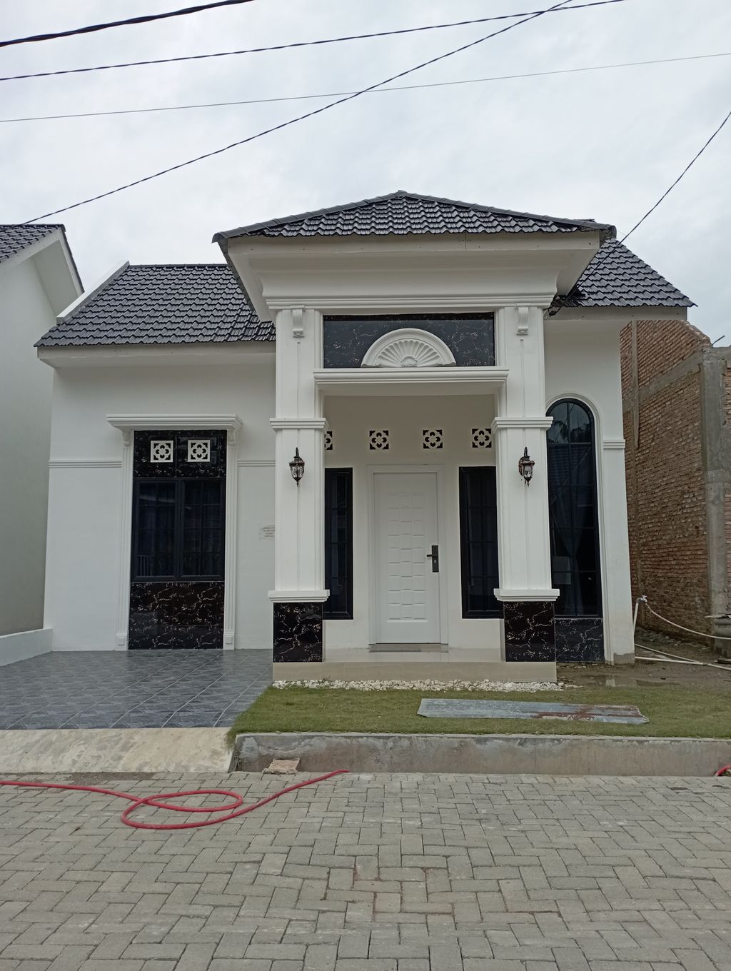 foto contoh rumah perumahan HARMONI REGENCY
