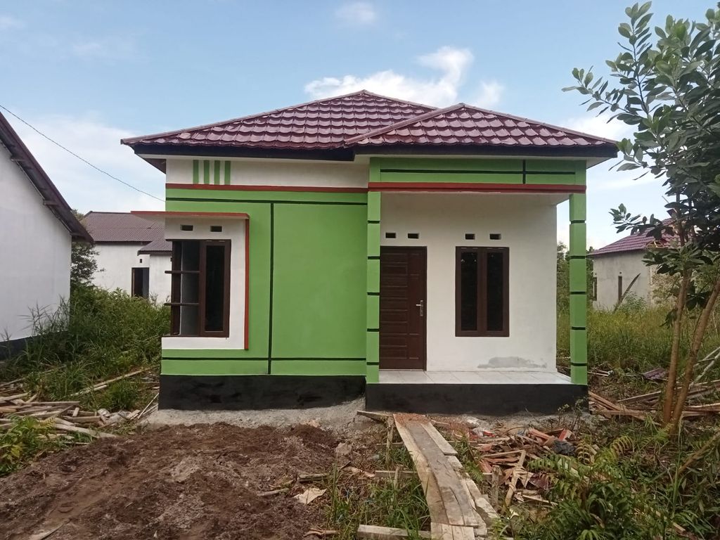 foto tampak rumah tipe 36 perumahan PURI TELAGA SARI AGUNG II