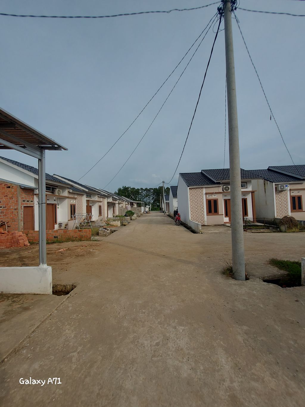 foto gerbang perumahan Queen Athalla Residence 1D