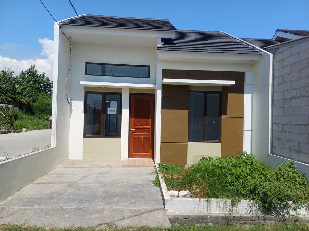 foto tampak rumah tipe Camelia perumahan Grand Bintang Mekarsari